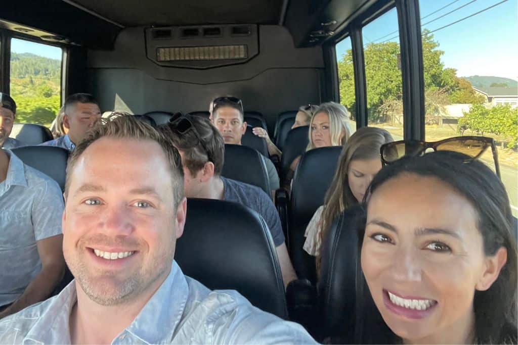 A group of friends together on a private tour in Napa Valley