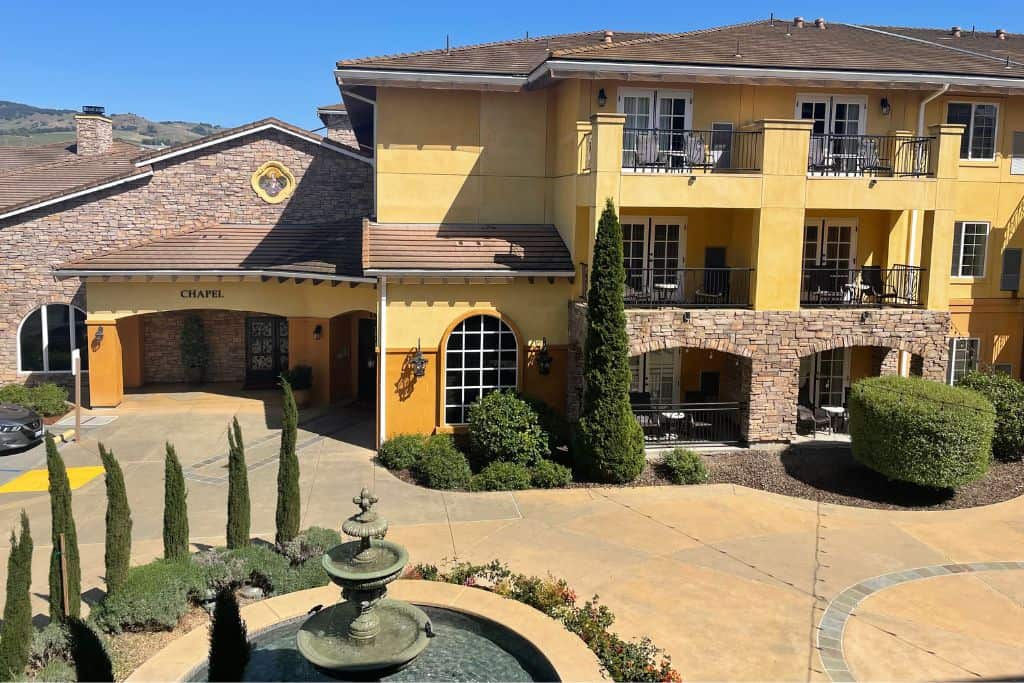 View of a fountain and the Tuscan inspired architecture at the Meritage Resort and Spa